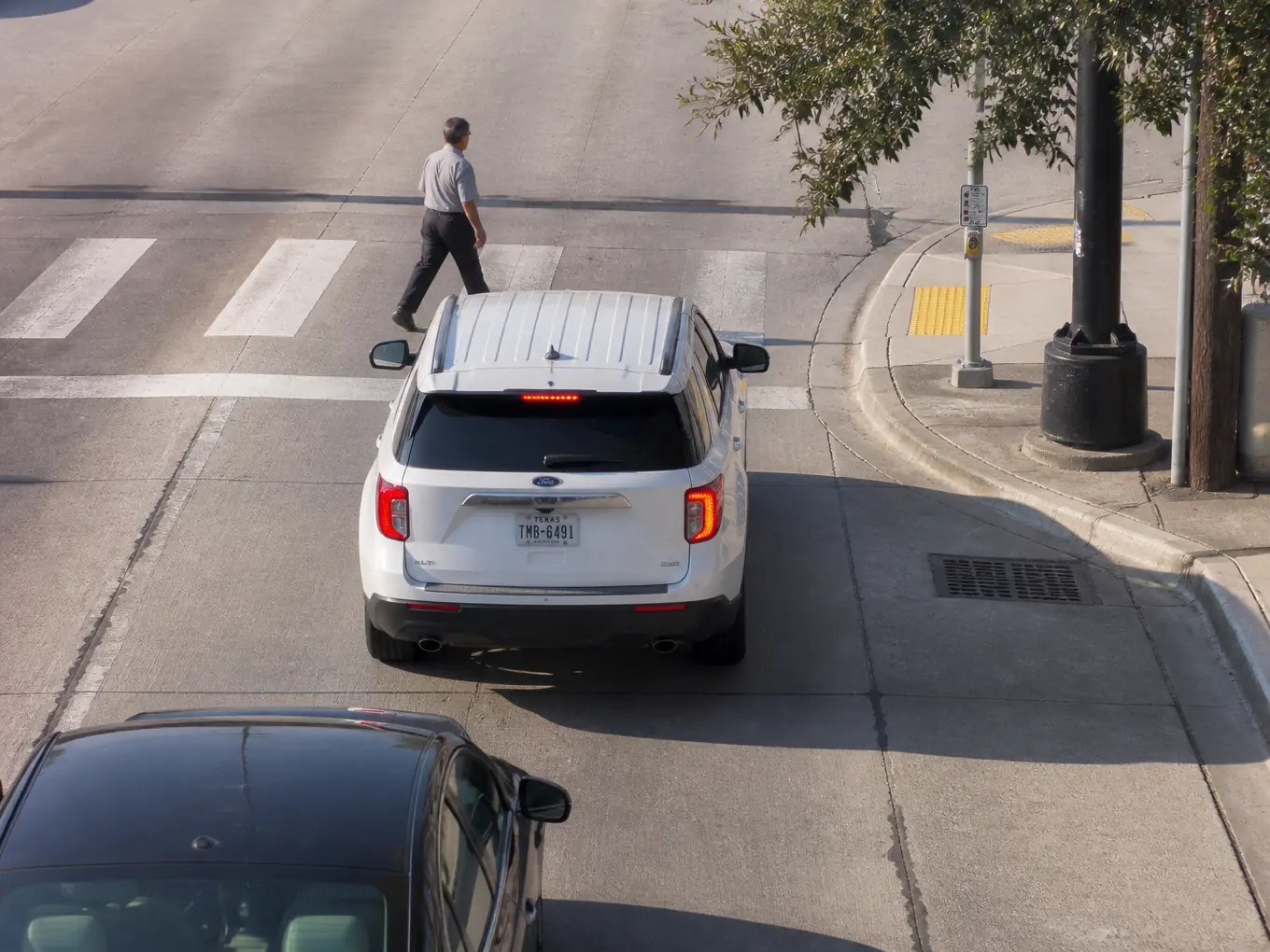 Synthetic camera illustration: SUV across the Marked Crossing