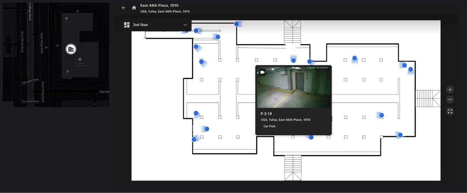 A second-floor plan inside the IREX map with camera icons and their view cones, a floor selector reading 2nd floor, a locator map at the left and a live preview pop-up from camera P-2-18 in a parking garage